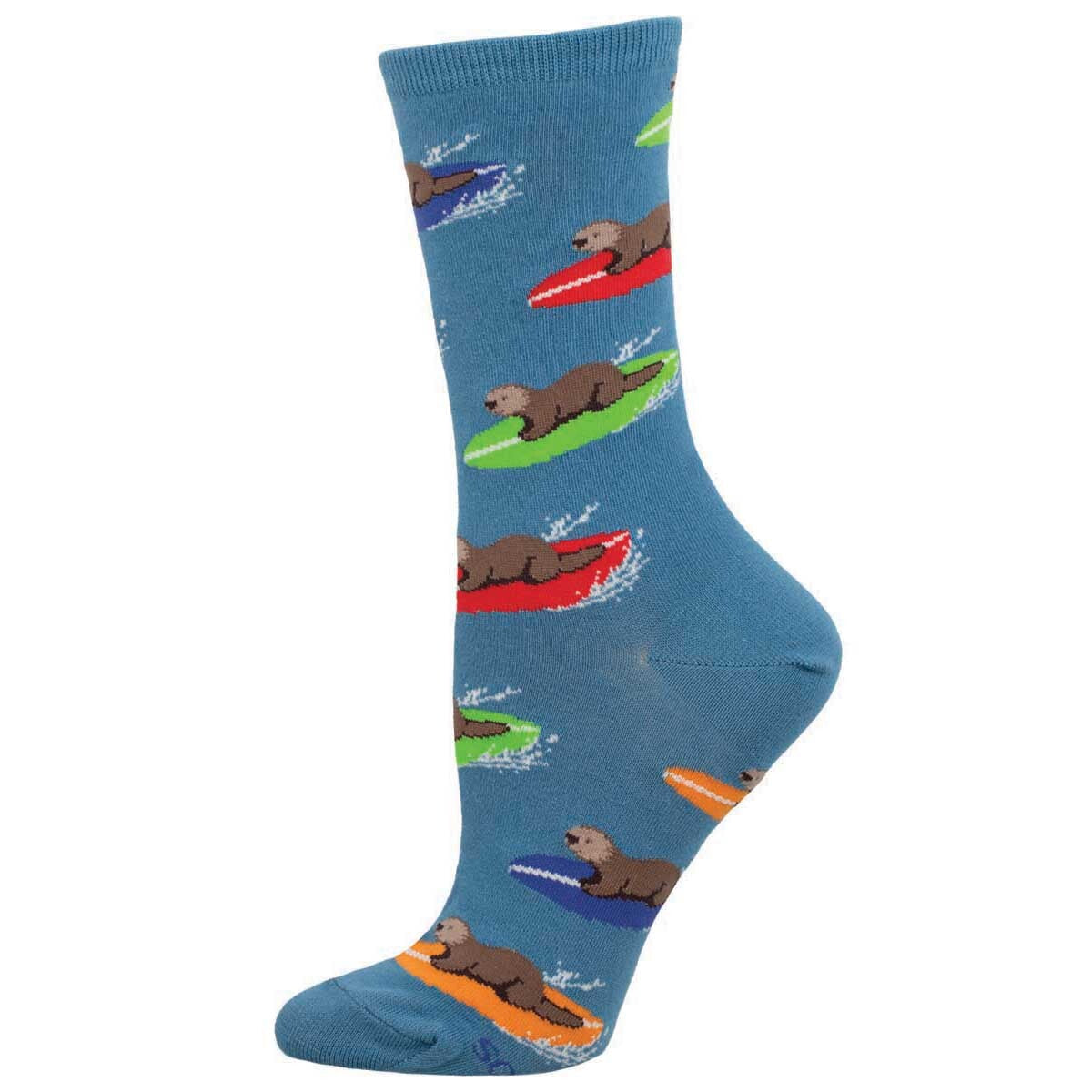 A pair of blue cotton crew socks with a pattern of otters surfing on colorful surfboards.