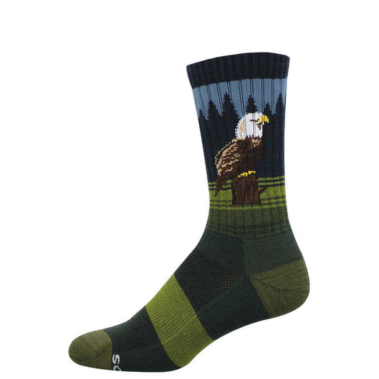 Sock with an eagle design against a forest-like background