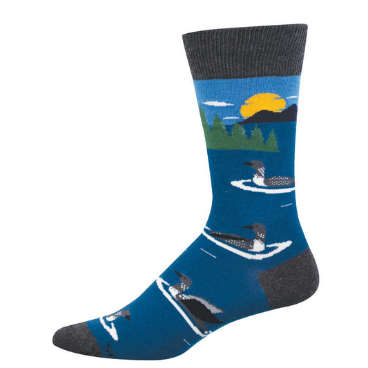 Blue sock with nature-themed design featuring loons and a sunset