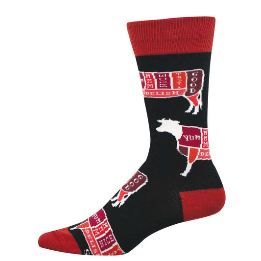 Black sock with red accents and cow design showing different cuts labeled 'yum', 'mmm', 'delish', and similar