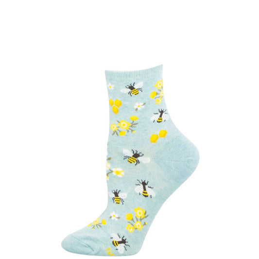 Light blue sock with bee and flower pattern on a white background