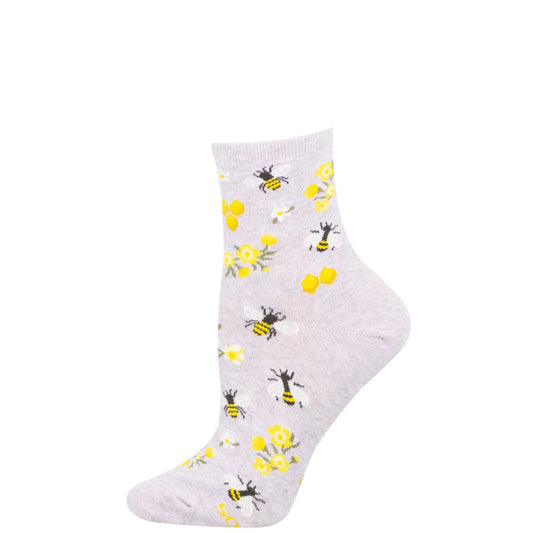 Light purple sock with bee and flower pattern on a white background