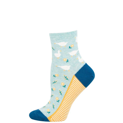 Light blue sock with a duck pattern on a white background