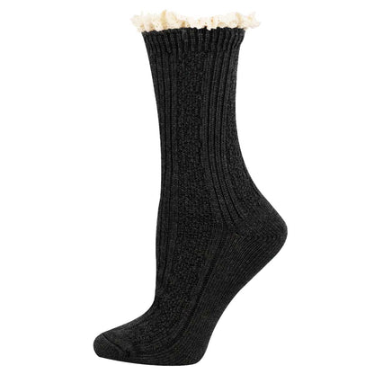 A single ribbed crew sock in black with a contrasting cream-colored fringed trim at the top, shown on a plain white background.