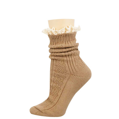 A single beige ribbed knit sock with a gathered, ruched texture and a decorative cream-colored ruffled trim at the top, displayed on a beige mannequin leg form against a plain white background.