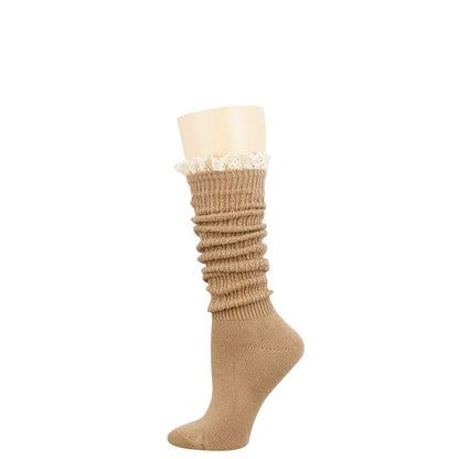A beige ribbed knee-high sock with a white lace ruffle at the top, displayed on a beige mannequin leg against a plain white background.