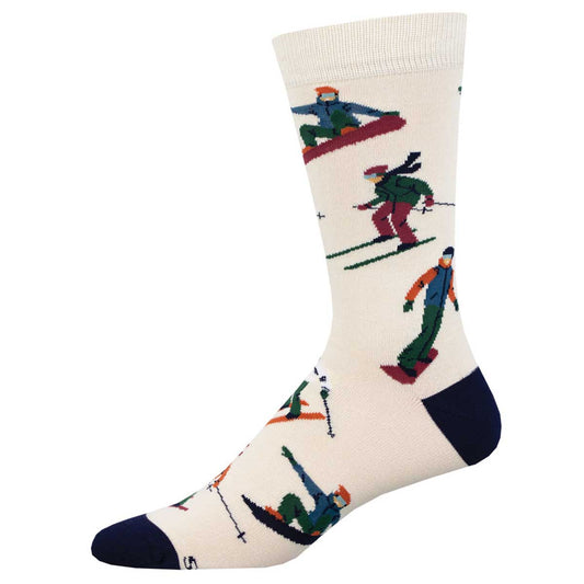 A pair of ivory bamboo socks with a pattern of skiing and snowboarding characters in various poses.