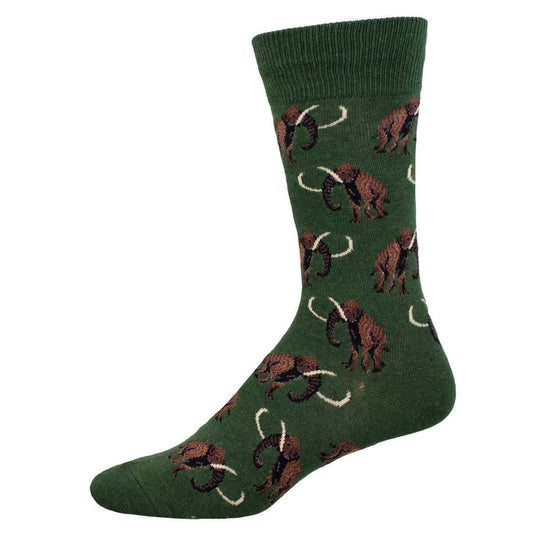 A green crew sock with a pattern of brown wooly mammoths and ice Age-era flora.