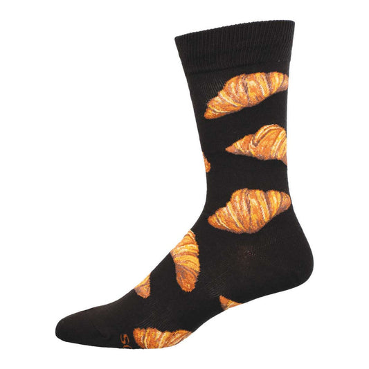 A black sock with a pattern of croissants in shades of brown.