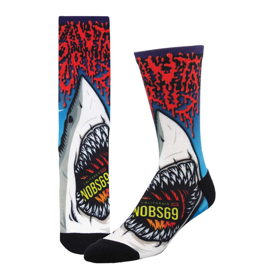 Shark-themed socks with "Santa Cruz" text in a bloody font