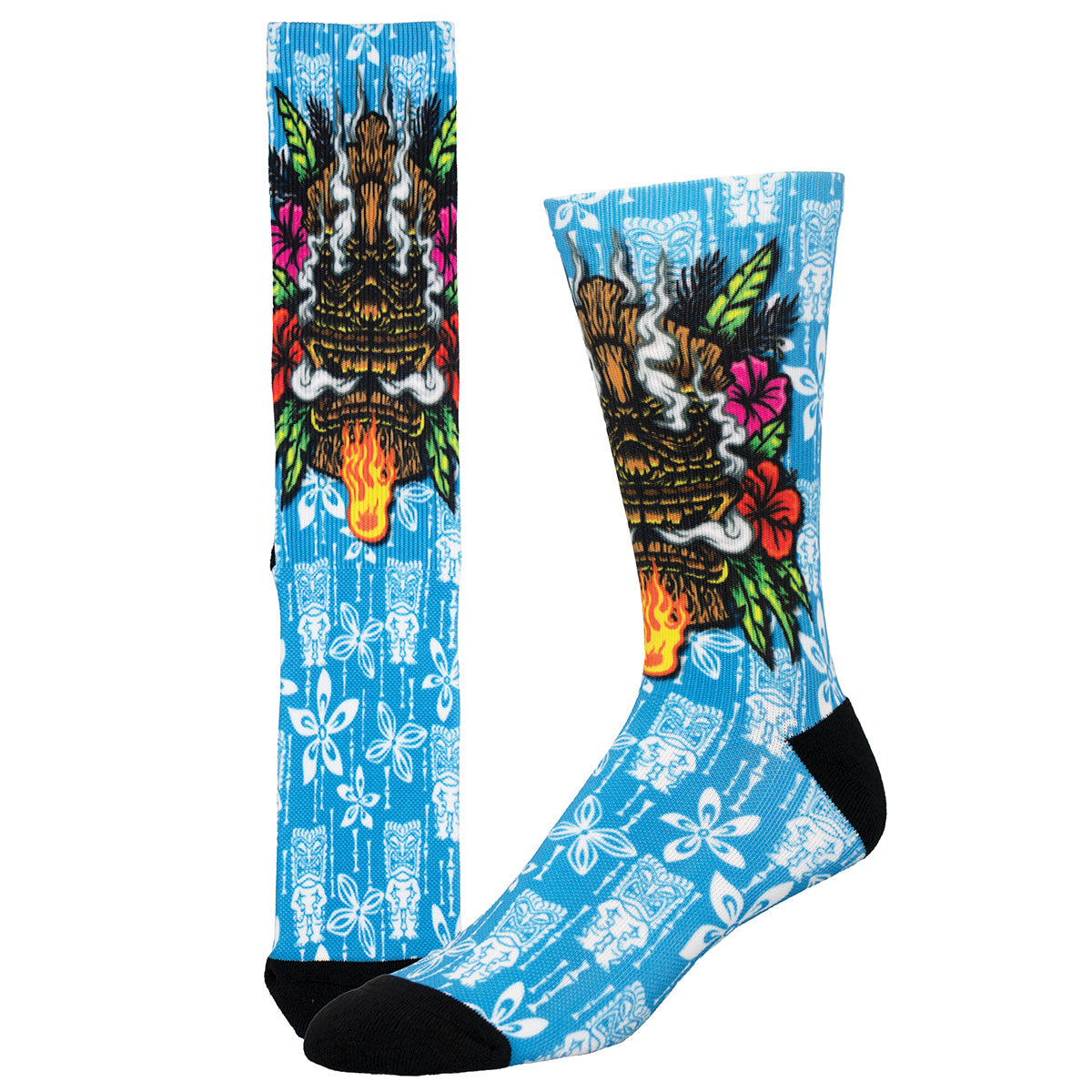 blue socks with a tiki face and tropical flowers
