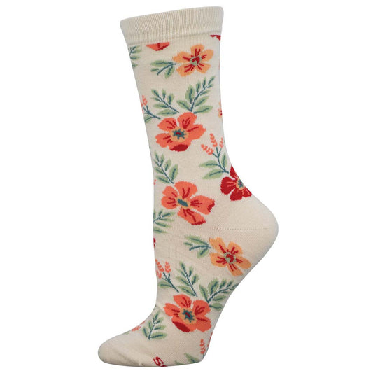 A pair of white crew socks with a floral pattern featuring shades of orange and green.