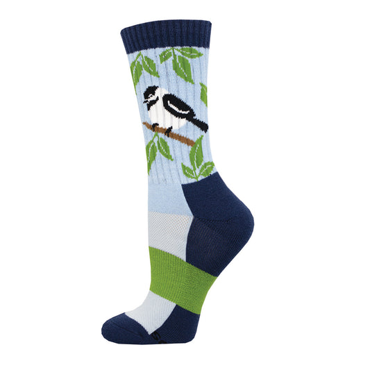 A pair of women's merino wool socks with a pattern of birds and leaves on a light blue background.