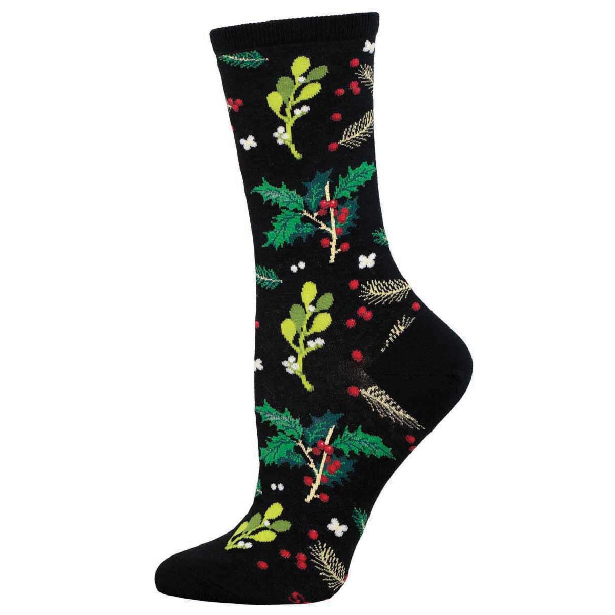 A pair of black cotton crew socks with a Christmas pattern featuring mistletoe and holly.