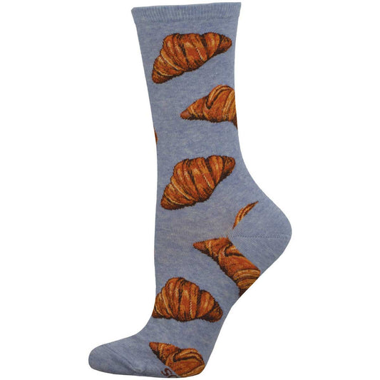 A pair of heather blue cotton crew socks with a pattern of croissants.