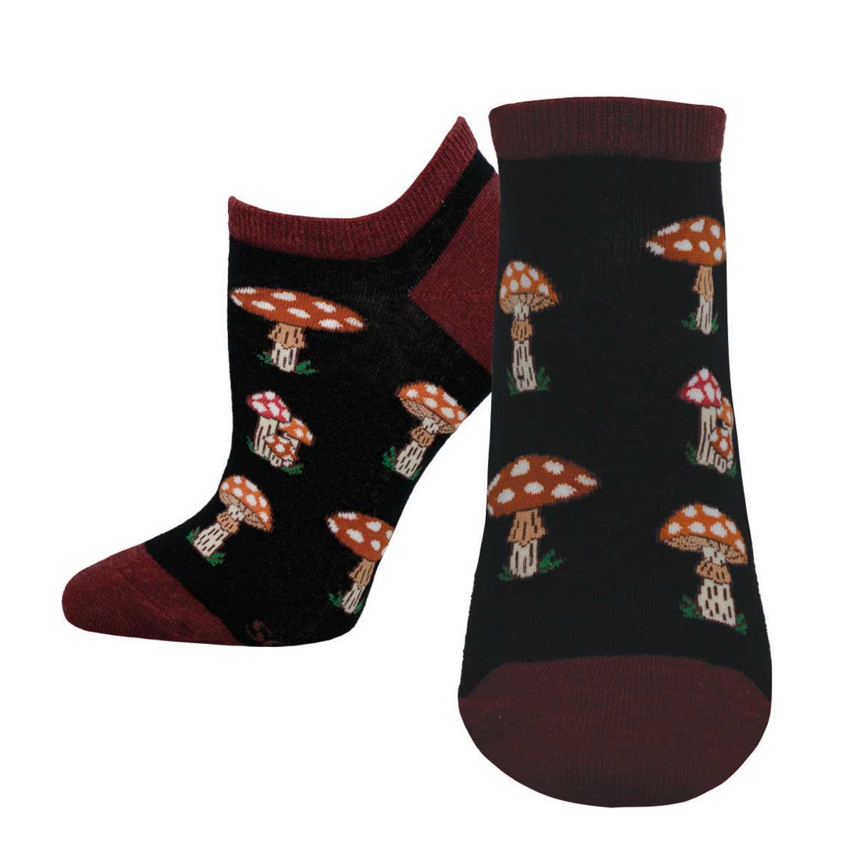 A pair of dark colored ankle socks with a pattern of white, red, and brown mushrooms
