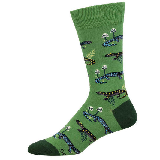 A green crew sock with a pattern of salamanders and foliage.