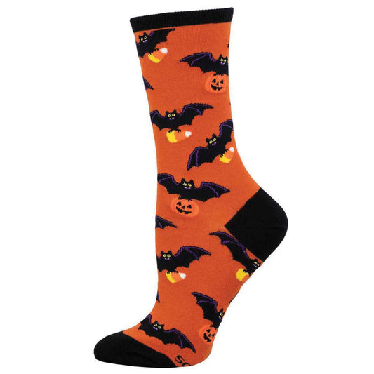 A pair of orange and black cotton crew socks with a Halloween pattern of bats and pumpkins.