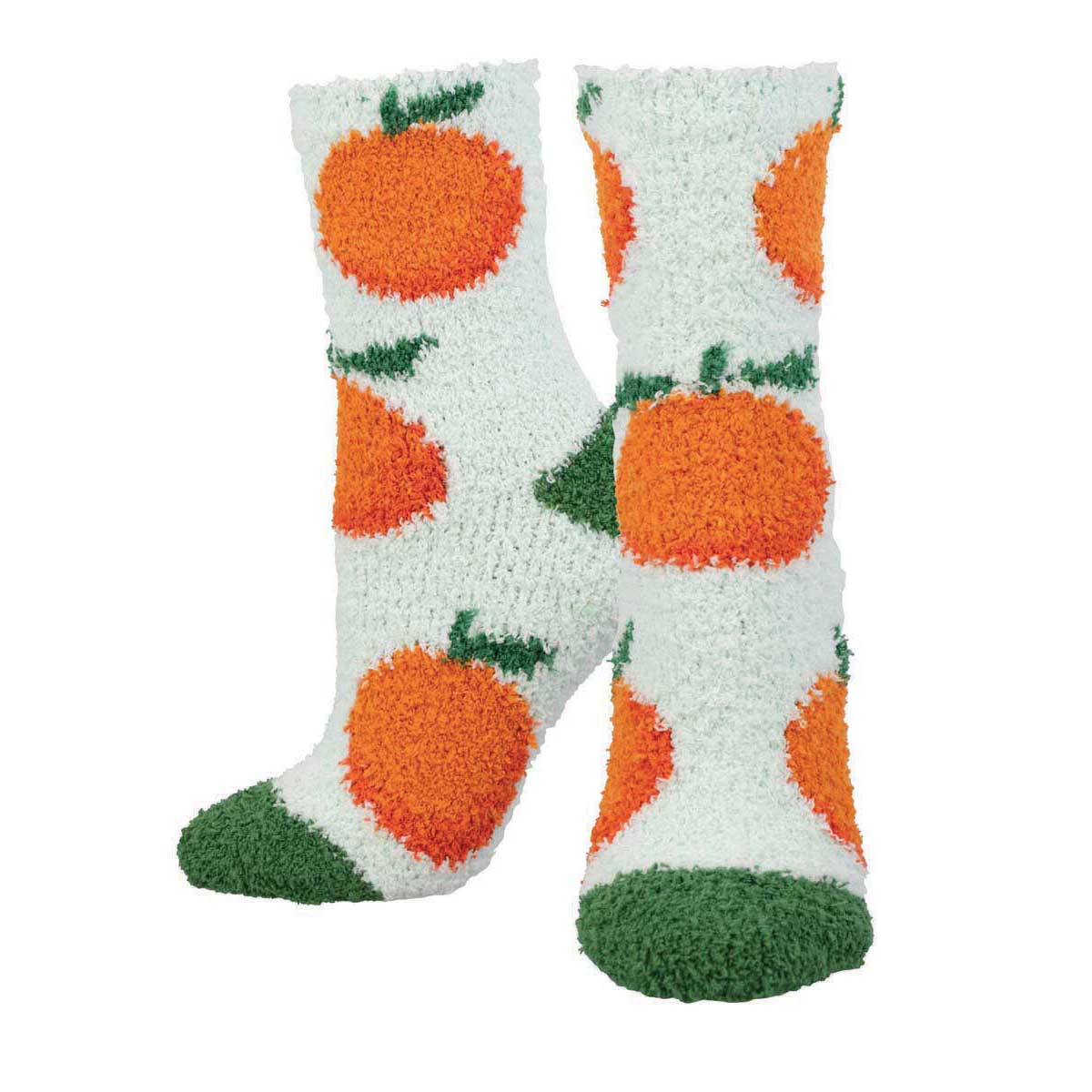 A pair of light green  fuzzy socks with an orange fruits repeat pattern throughout.