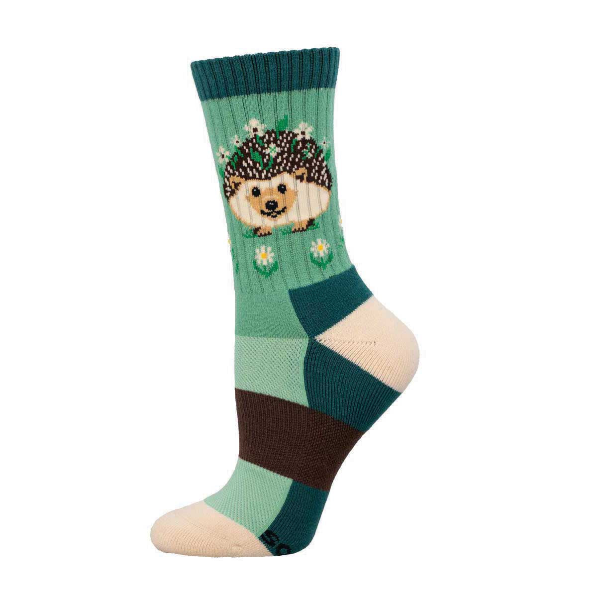 A Merino wool sock with a colorful design featuring a hedgehog with flowers on its back, predominantly in green, beige, and brown tones.