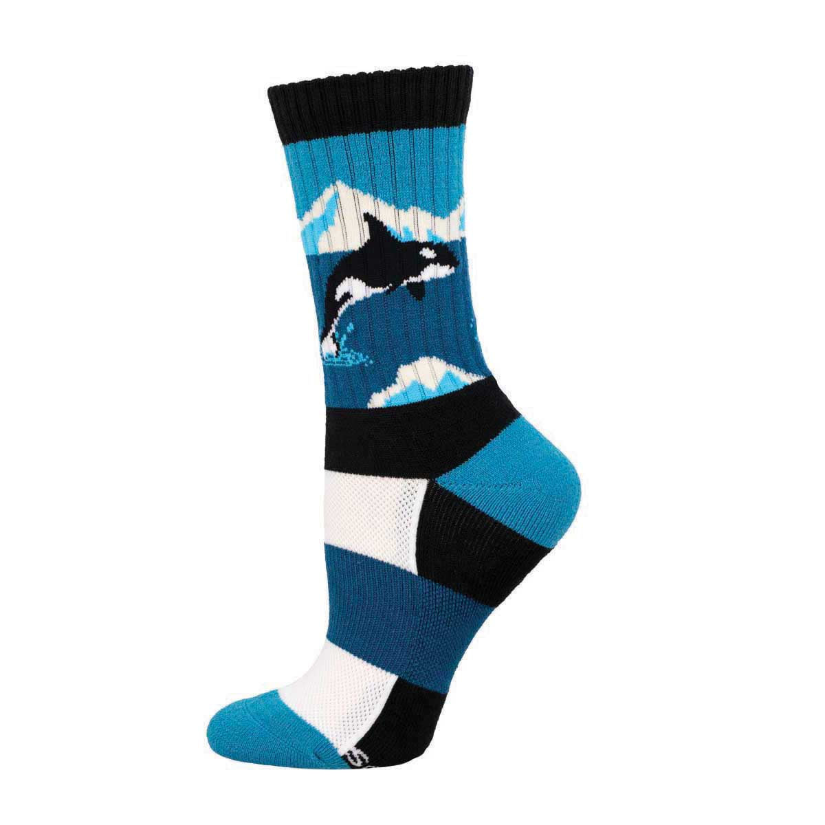 A pair of crew socks with a geometric pattern featuring blues and blacks, and an orca design near the cuff.