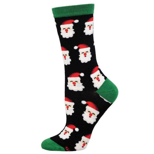 A pair of women's bamboo socks with a Christmas theme, featuring Santa Claus faces on a black background with green cuffs.