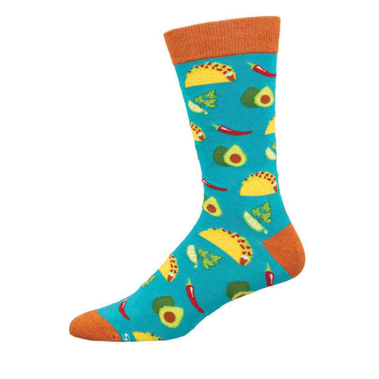 A pair of colorful socks with a pattern of tacos, avocados, and chilies on a blue background with orange at the top and bottom.