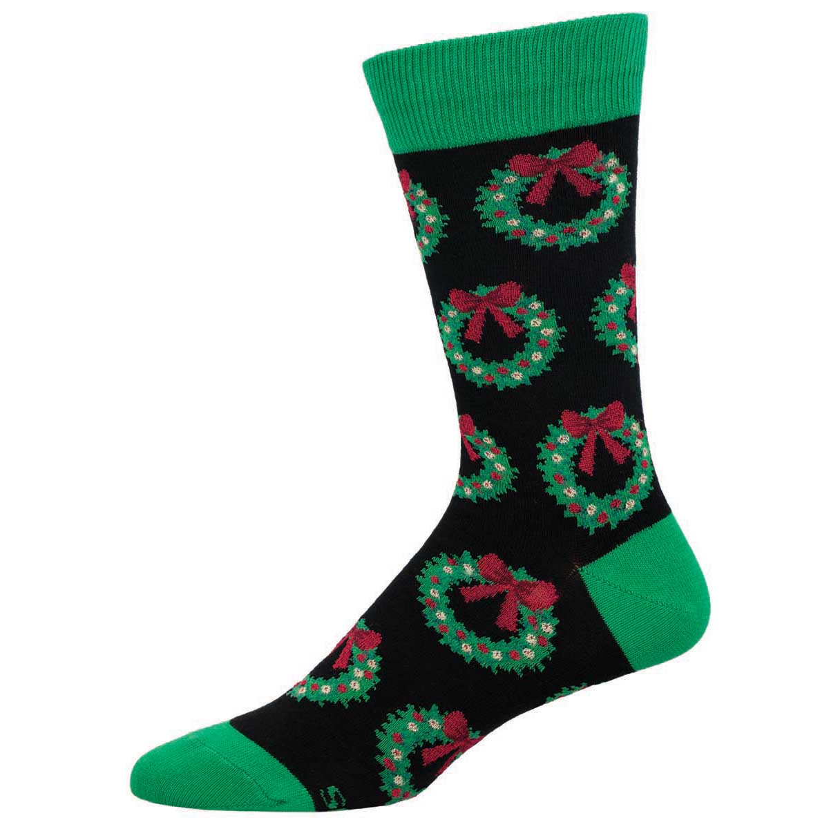 A pair of Christmas-themed crew socks with green cuffs and a pattern of red and green wreaths on a black background.