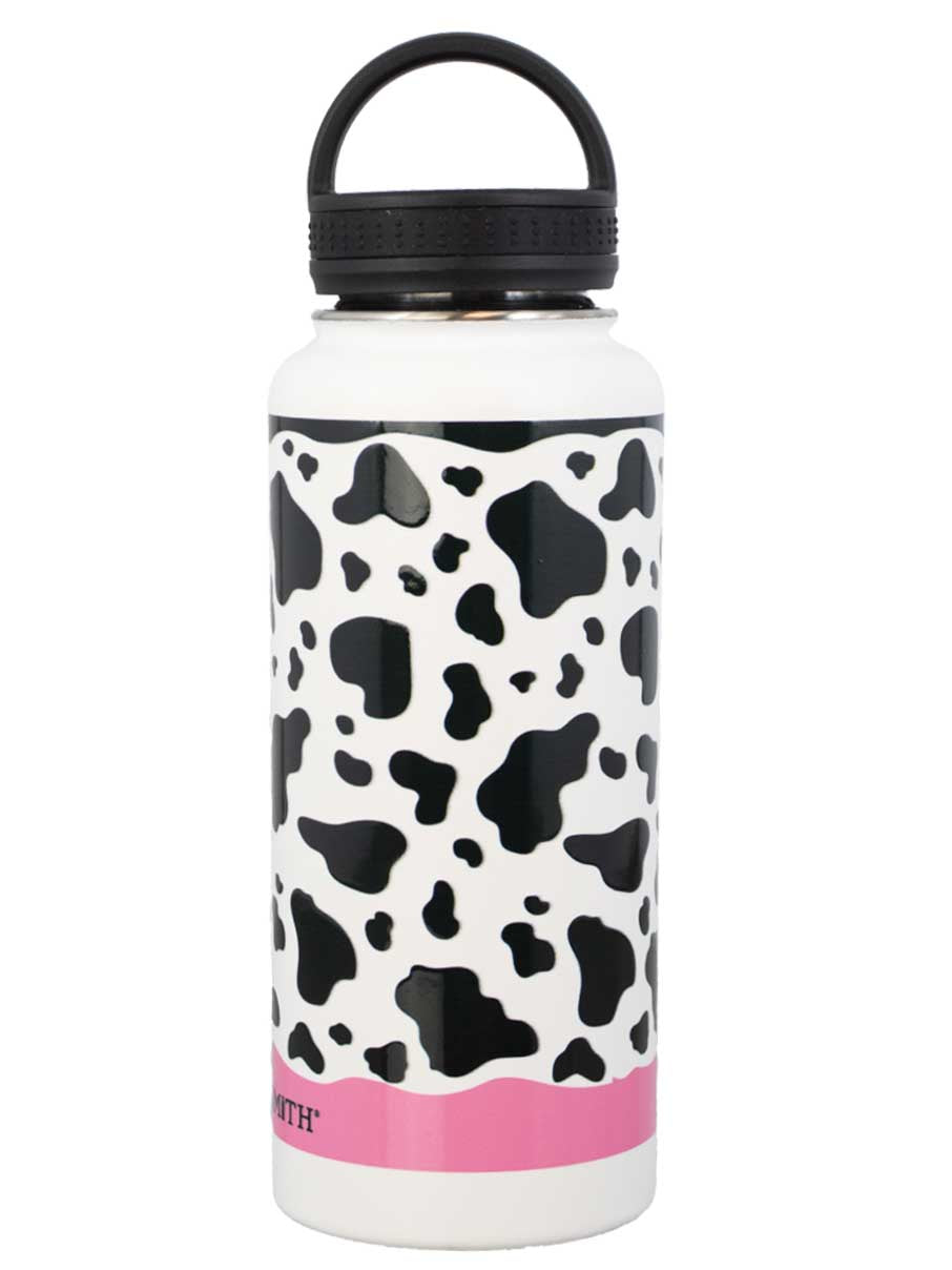 A white stainless steel insulated bottle with a black lid and a cow print design in black and pink details.