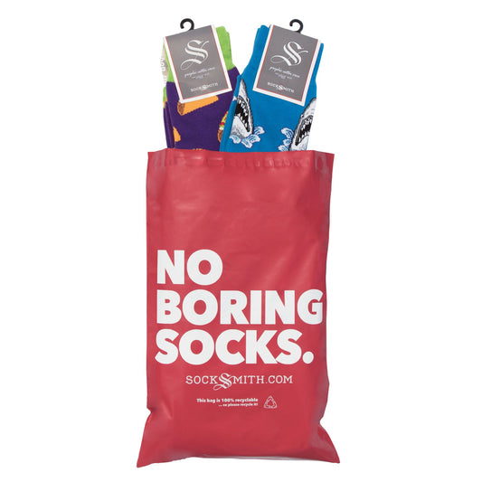 An example of a Men's Sock of the Month Subscription bag with two pairs of fun socks inside